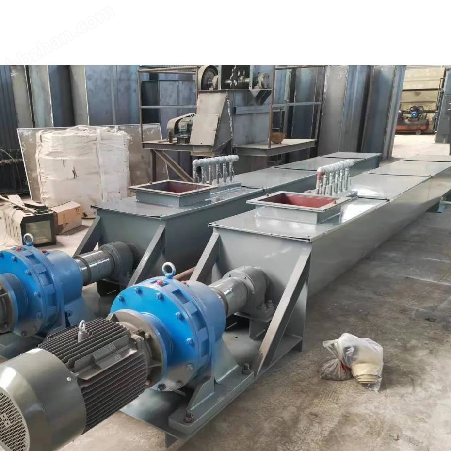 Tilted shaftless screw conveyor